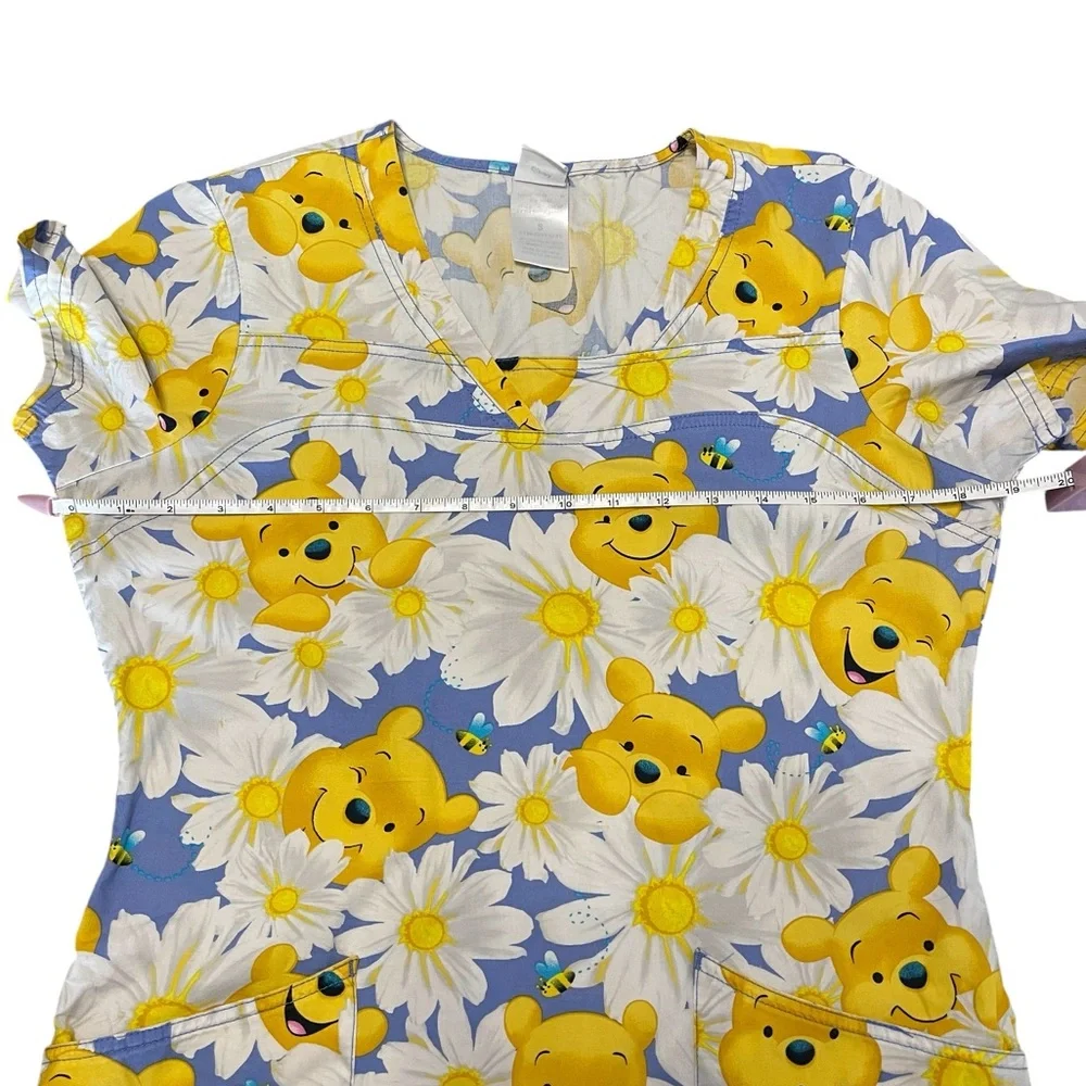 Disney Blue and Yellow Floral Print Adult Woman’s Scrub.
Size S - Picture 8 of 13